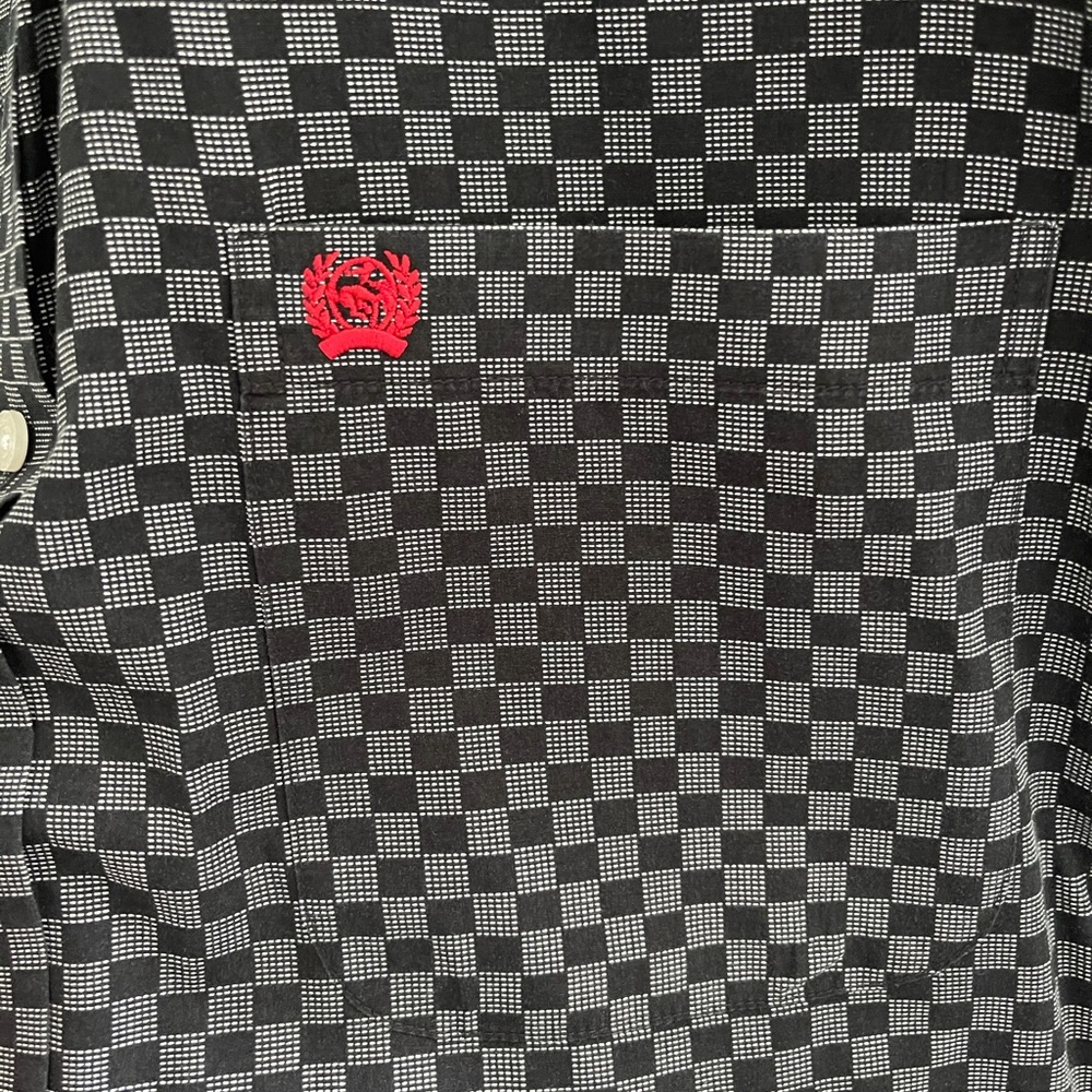 Like new cinch shirt. Size M. Always taken to cleaners never machine washed.